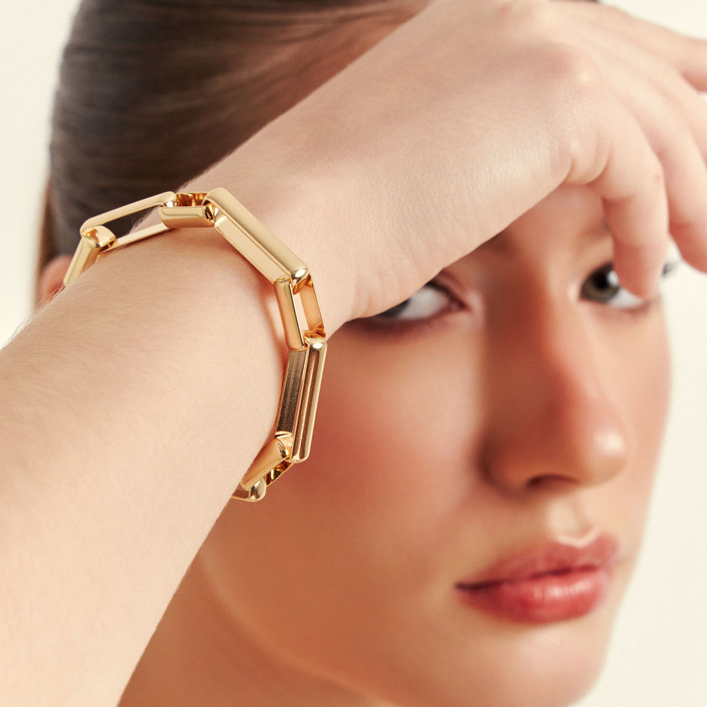 PULSEIRA LISA COM ELOS RETANGULARES INTERCALADOS E FECHO BOIA