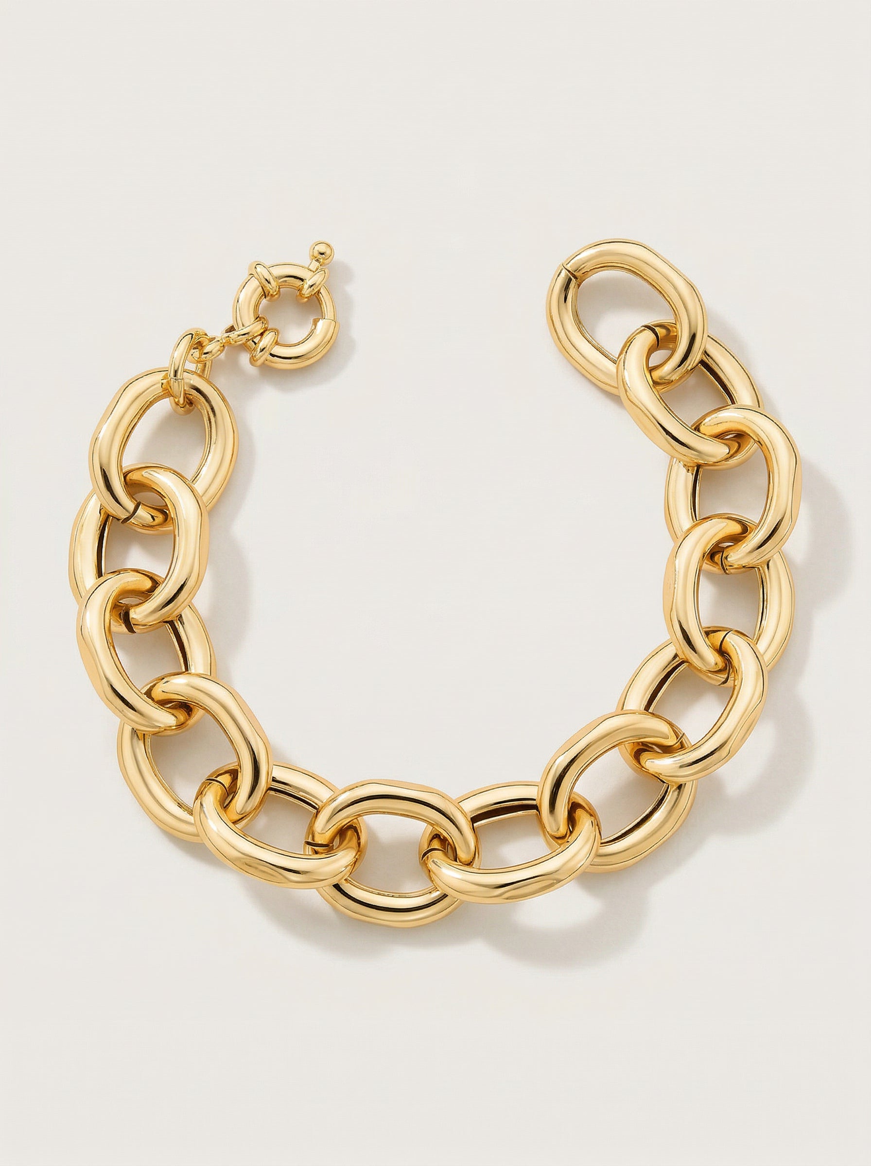 PULSEIRA COM ELOS OVAIS VAZADOS E FECHO BOIA