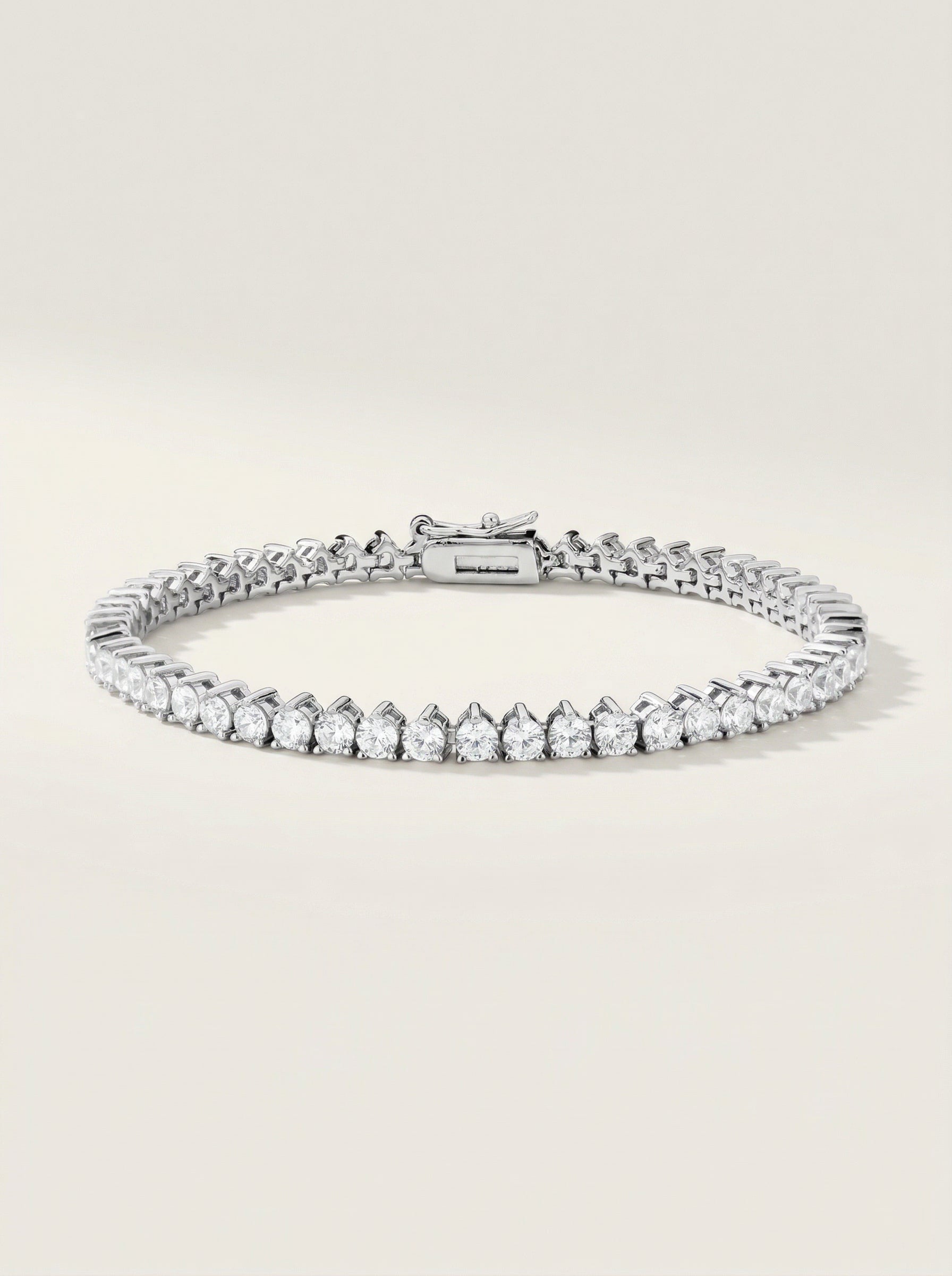 PULSEIRA RIVIERA COM CRISTAIS REDONDOS