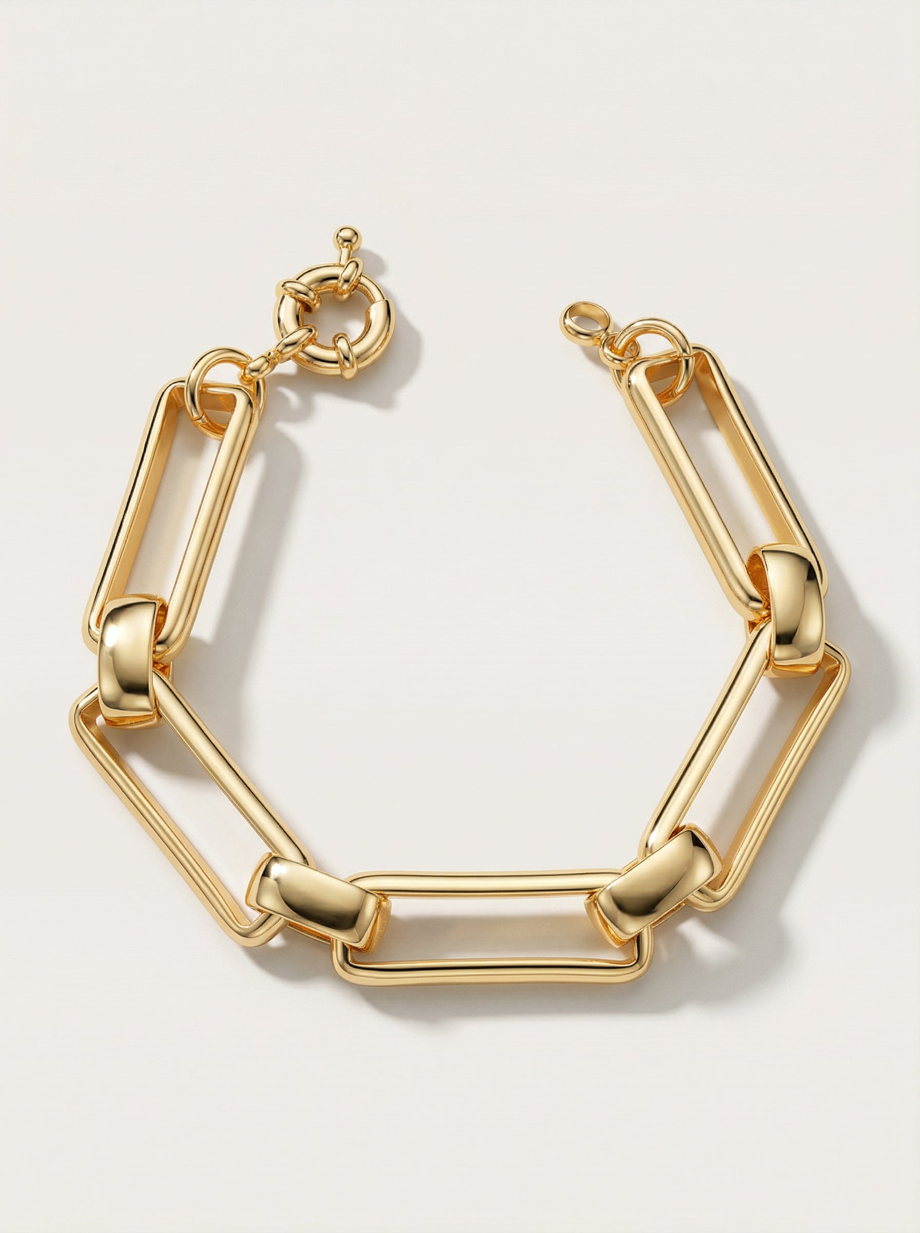 PULSEIRA COM ELOS RETANGULARES LISOS BANHADA A OURO